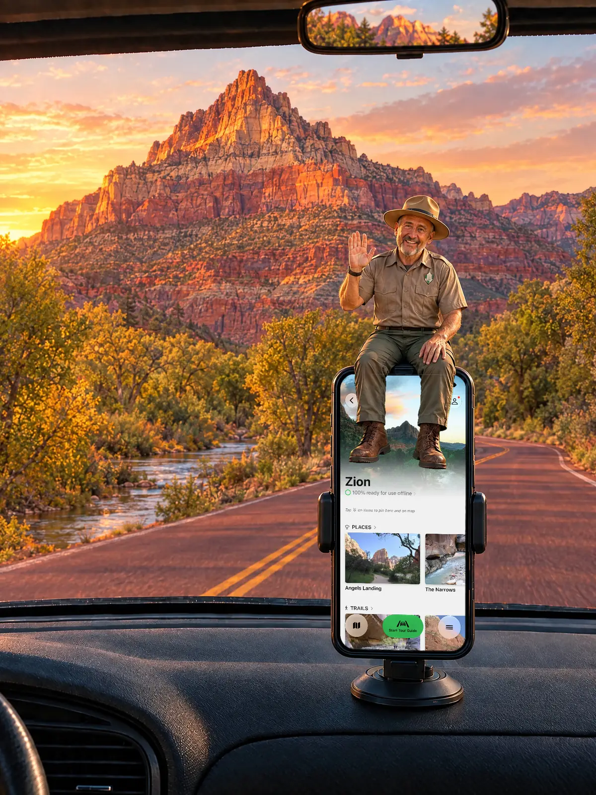 The Parkwolf tour guide waving from a dashboard phone at sunset, with The Watchman above the Virgin River near Canyon Junction